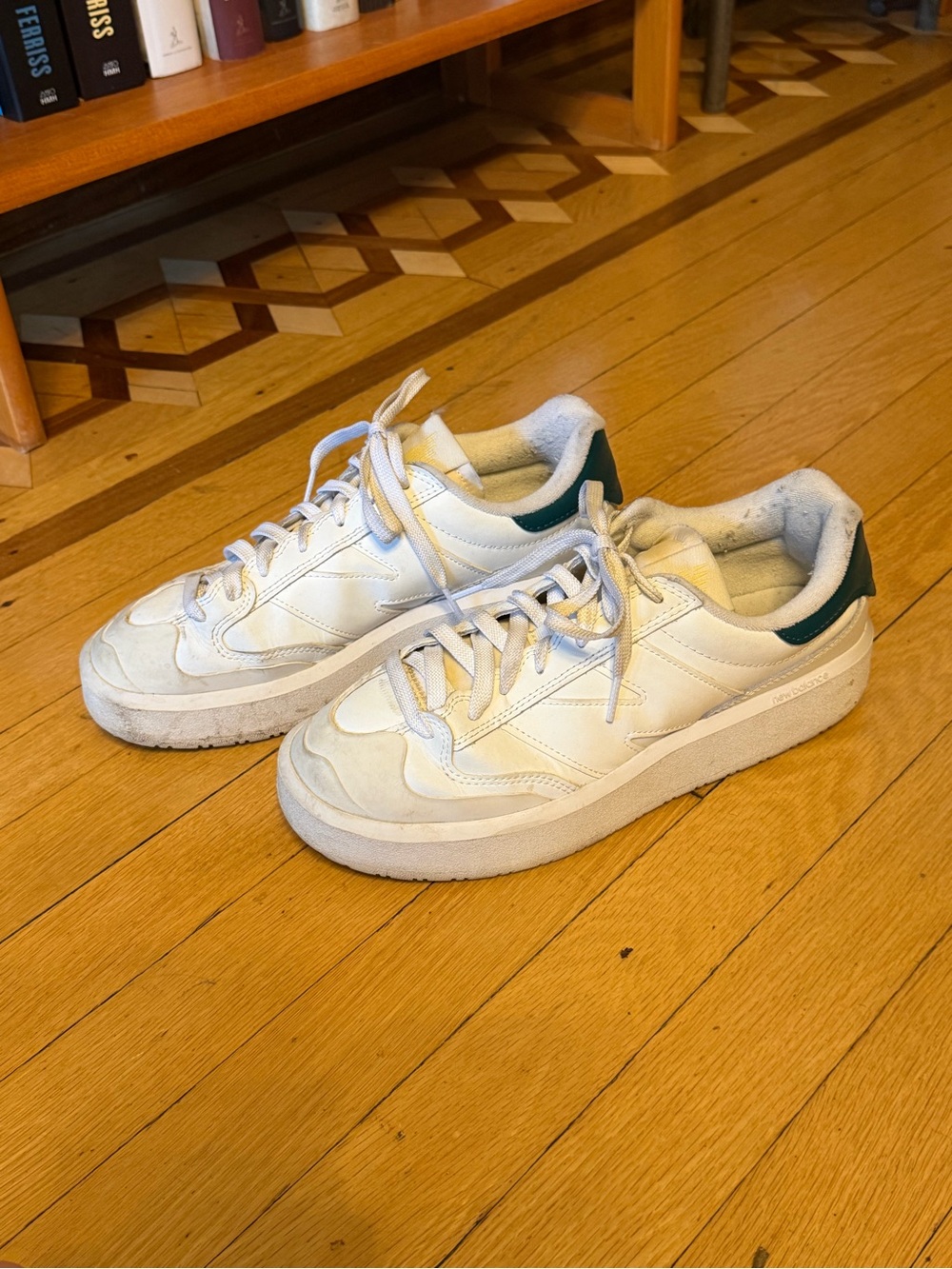 Women’s White Leather Low-Top New Balance Sneakers with Green Heel Accent